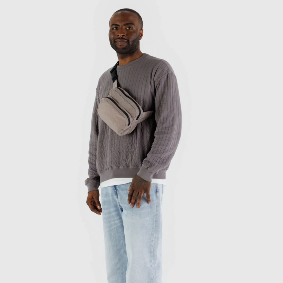 Fanny pack worn hoh over shoulder