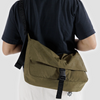 Baggu Nylon Messenger Bag in Seaweed being worn by man